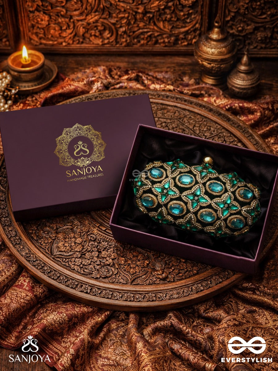Neelzara – Oval Dark Green Velvet Clutch With Intricate Stone And Zardozi Work And Golden Metal Frame