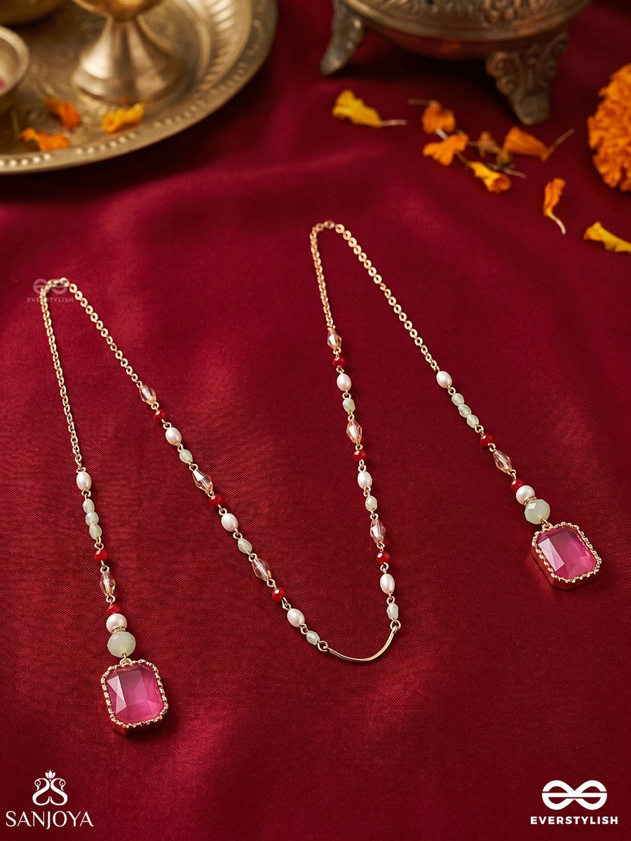 Gulabrekhi – Rose-Toned Trace – Elegant Face Let With Slender Gold-Tone Chains, Magenta Side Stones, Pearl Accents And Delicate Red Bead Details