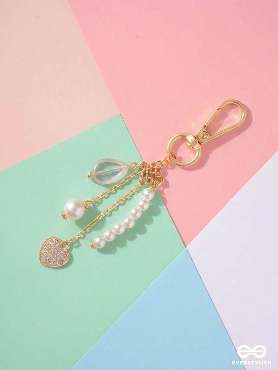 Pearl Perfection – Coquette Bag Charm With Bow Details