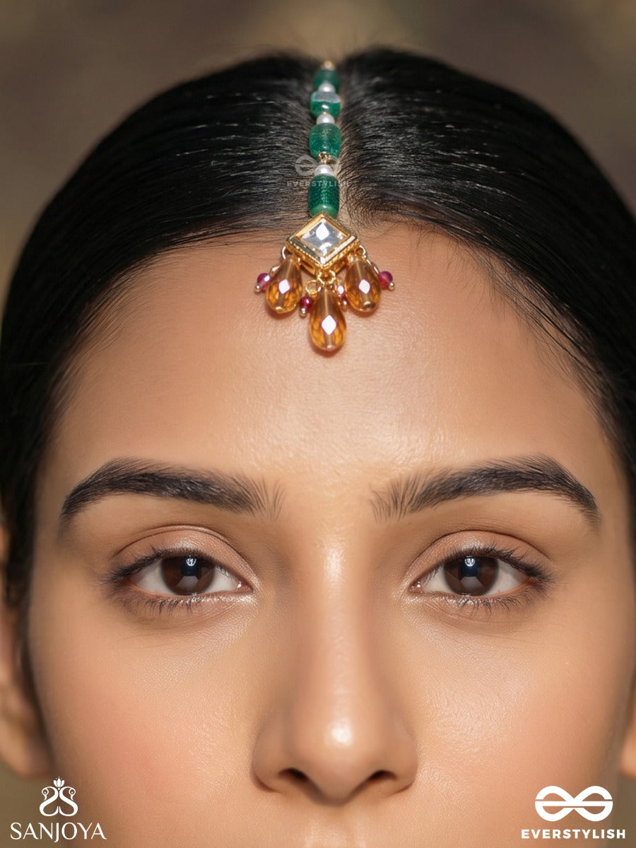 Pravaalika – Coral Beauty – Ornate Maangtika With Carved Emerald Beads, Kundan Centre And Amber Drop Accents