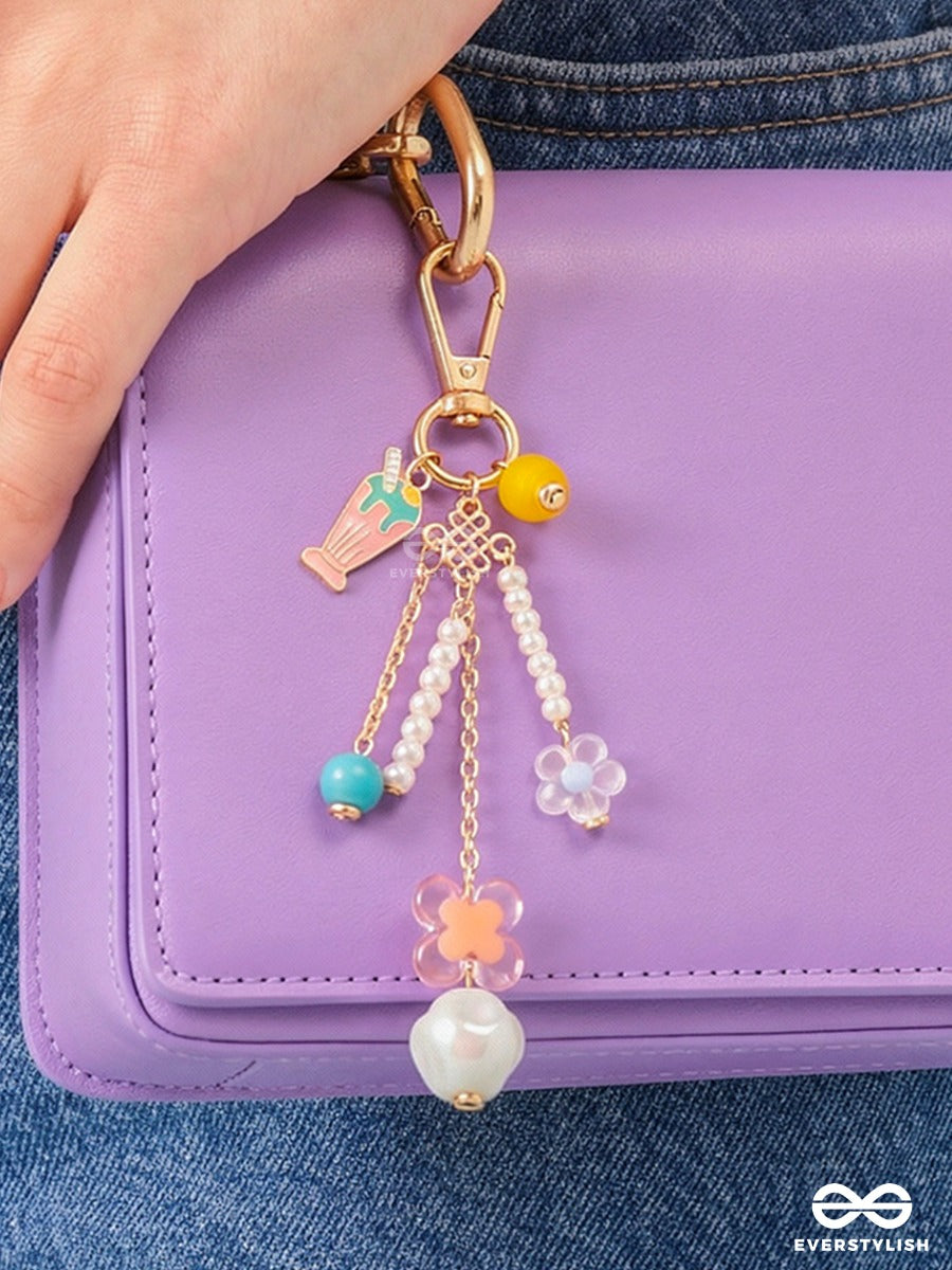 Pocket Bloom – Pastel Bag Charm With Floral And Pearl Details