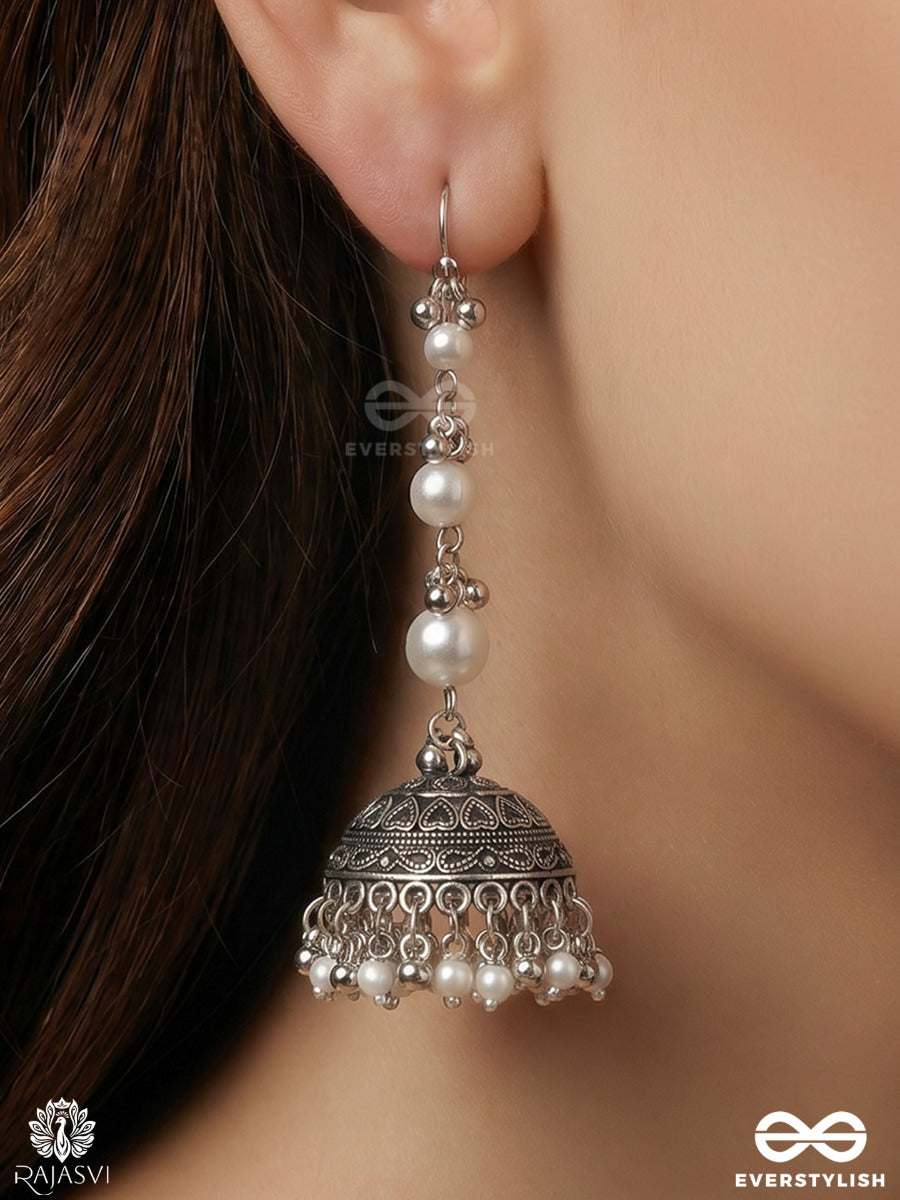 Chandrima – Oxidised Jhumkas With Lustrous Pearl Strands And Carved Dome
