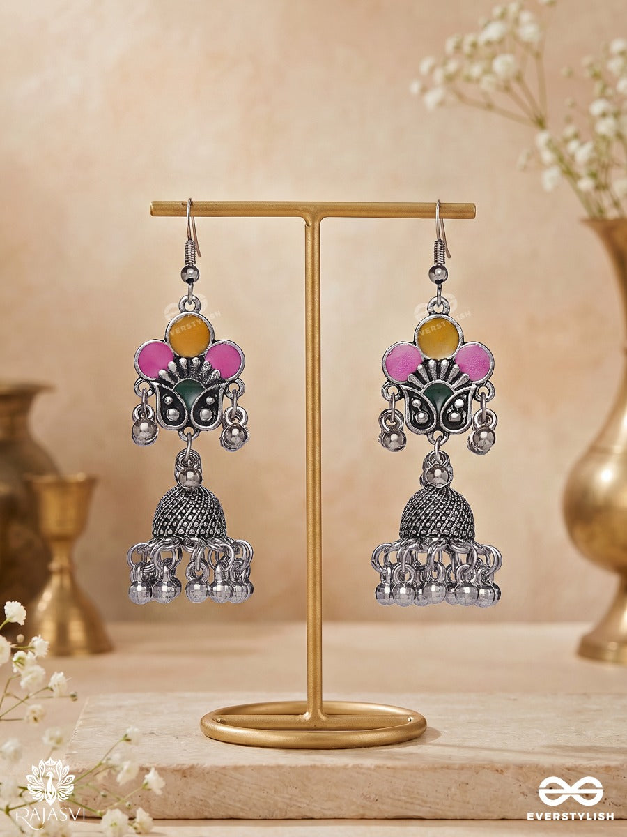 Basantika – Oxidised Heritage Jhumka Earrings With Pink And Mustard Floral Motifs, Green Accents And Ghungroo Fringes