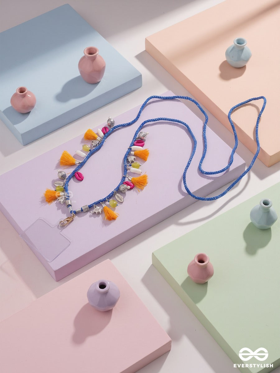 Banjara – Braided Blue Phone Sling With Tassels, Shell Charms And Multicolour Beads