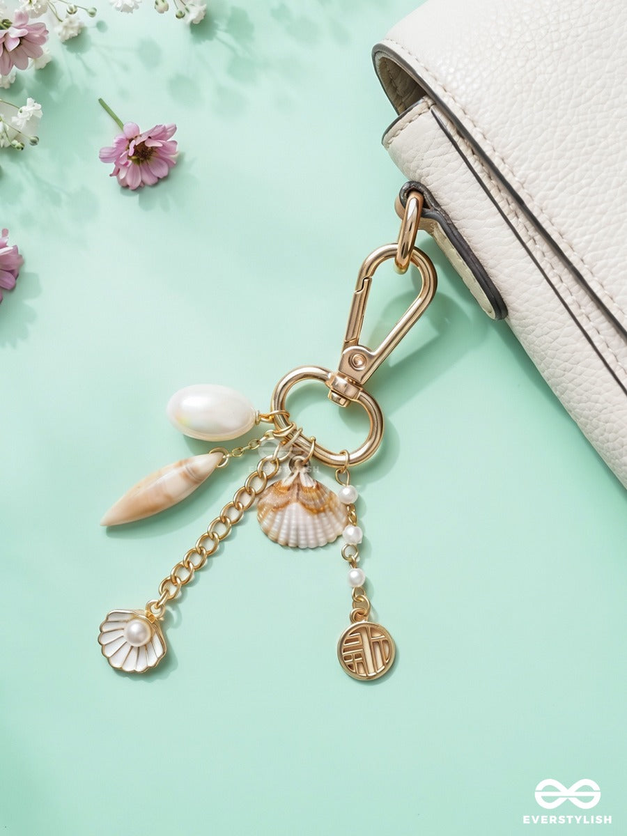 Seas The Day – Coastal Bag Charm With Shell Details And Pearl Accents