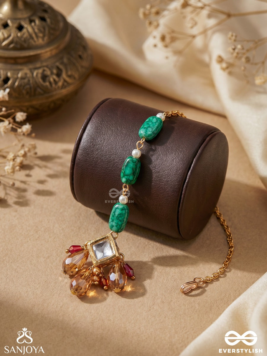 Pravaalika – Coral Beauty – Ornate Maangtika With Carved Emerald Beads, Kundan Centre And Amber Drop Accents
