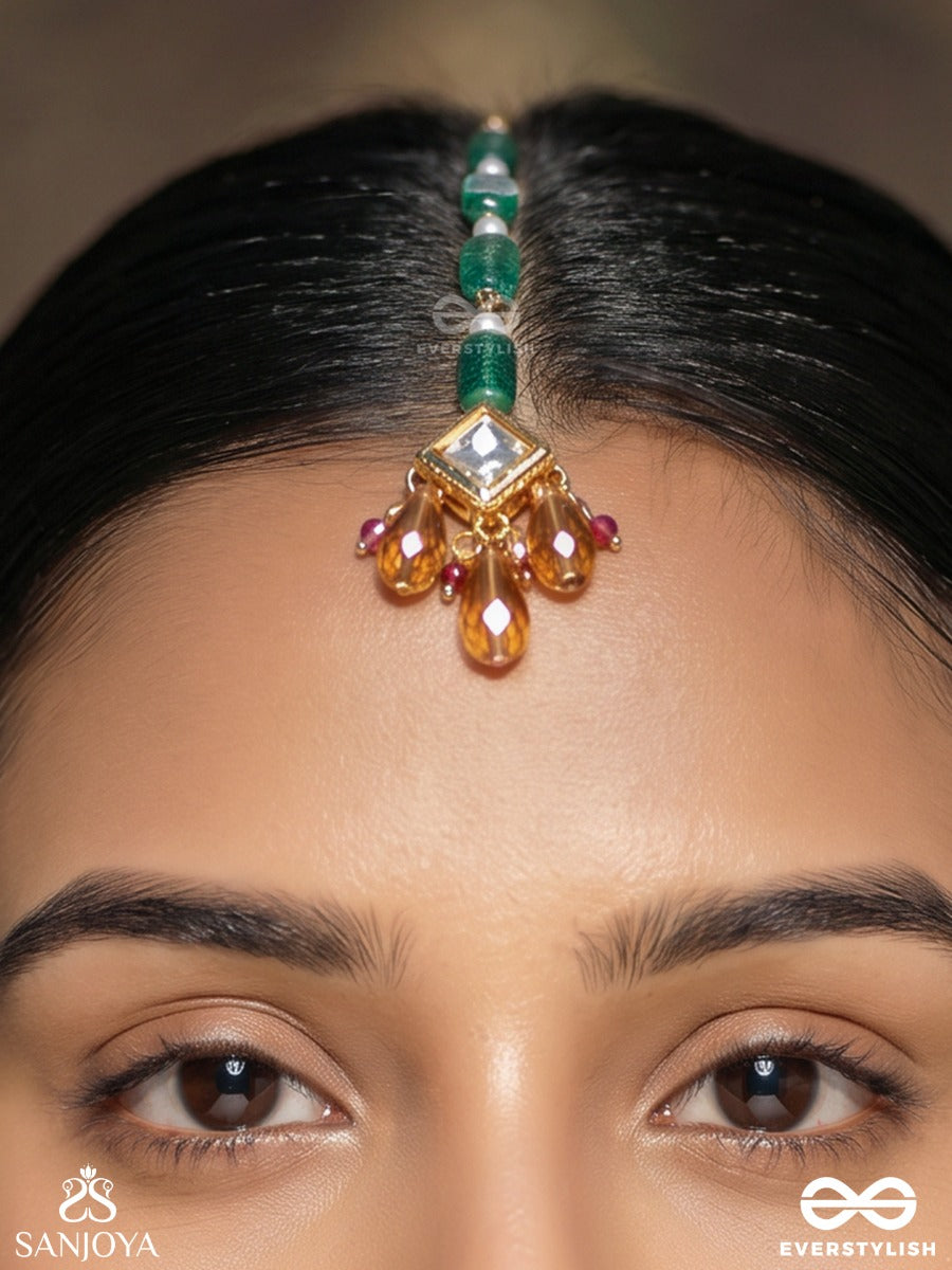 Pravaalika – Coral Beauty – Ornate Maangtika With Carved Emerald Beads, Kundan Centre And Amber Drop Accents