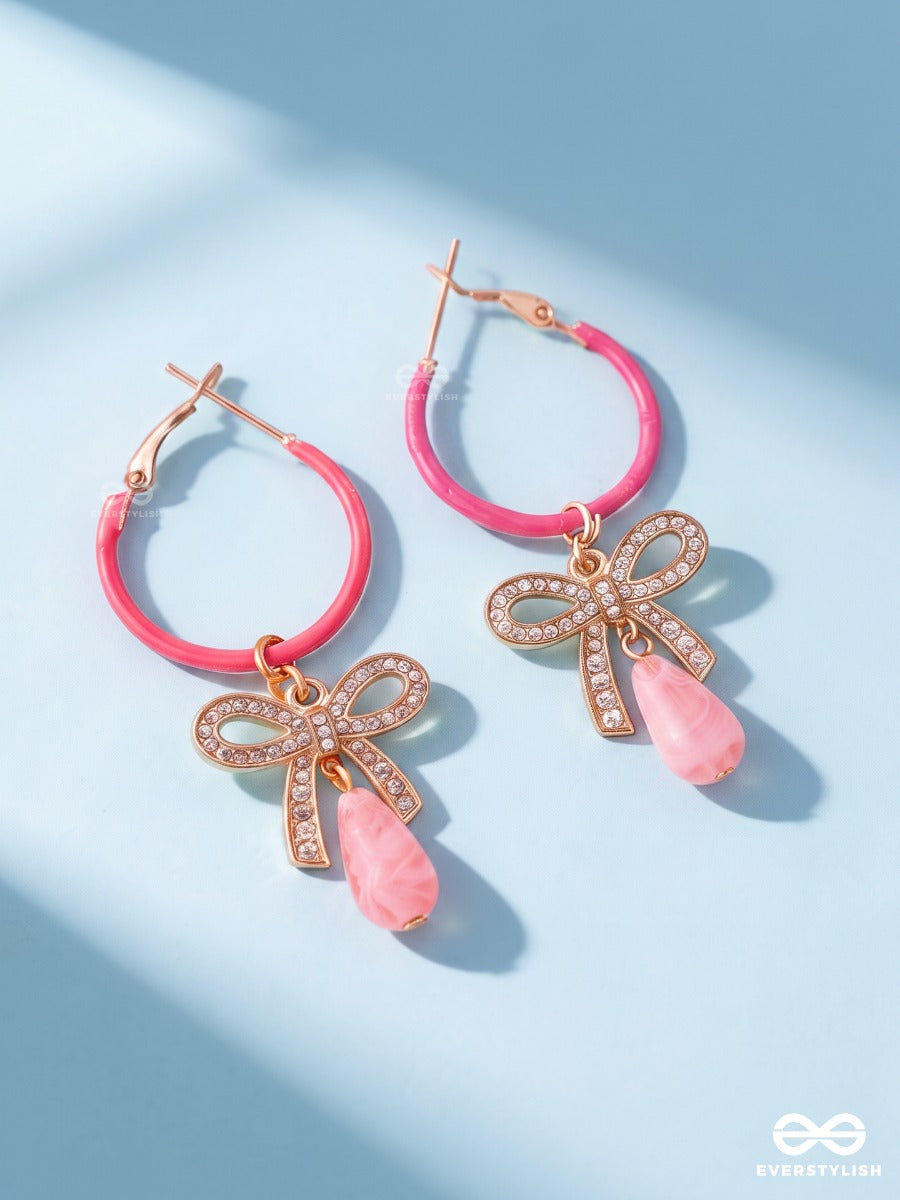 Pink Papillon – Pink Hoop Earrings With Crystal Bow And Drop Charms