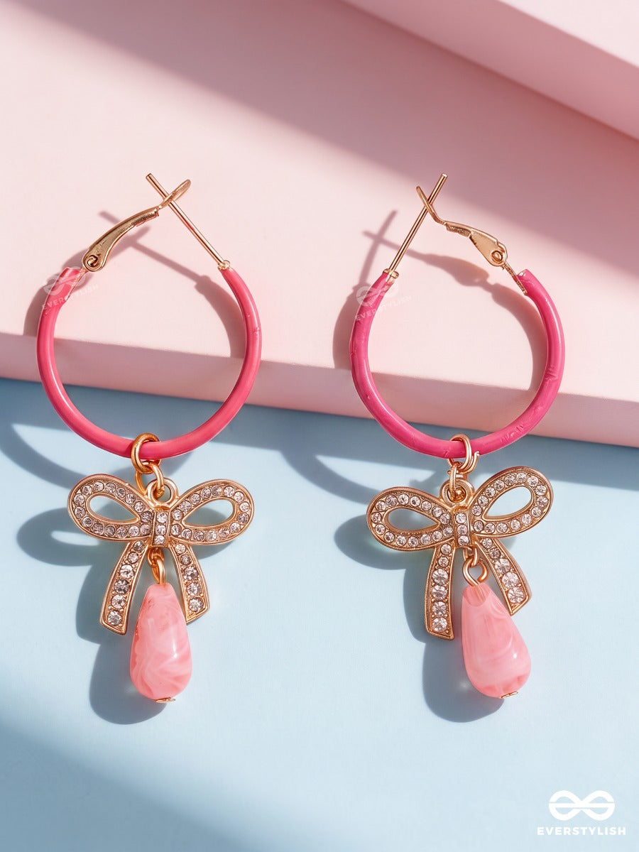 Pink Papillon – Pink Hoop Earrings With Crystal Bow And Drop Charms