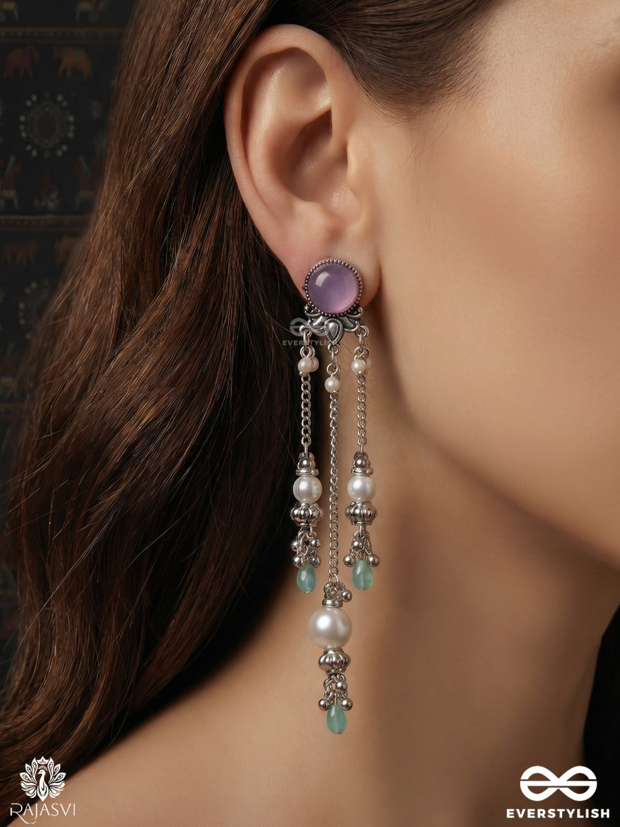Lilavati – Oxidised Long Earrings With Lilac Stones, Floral Charms And Pearl Drops