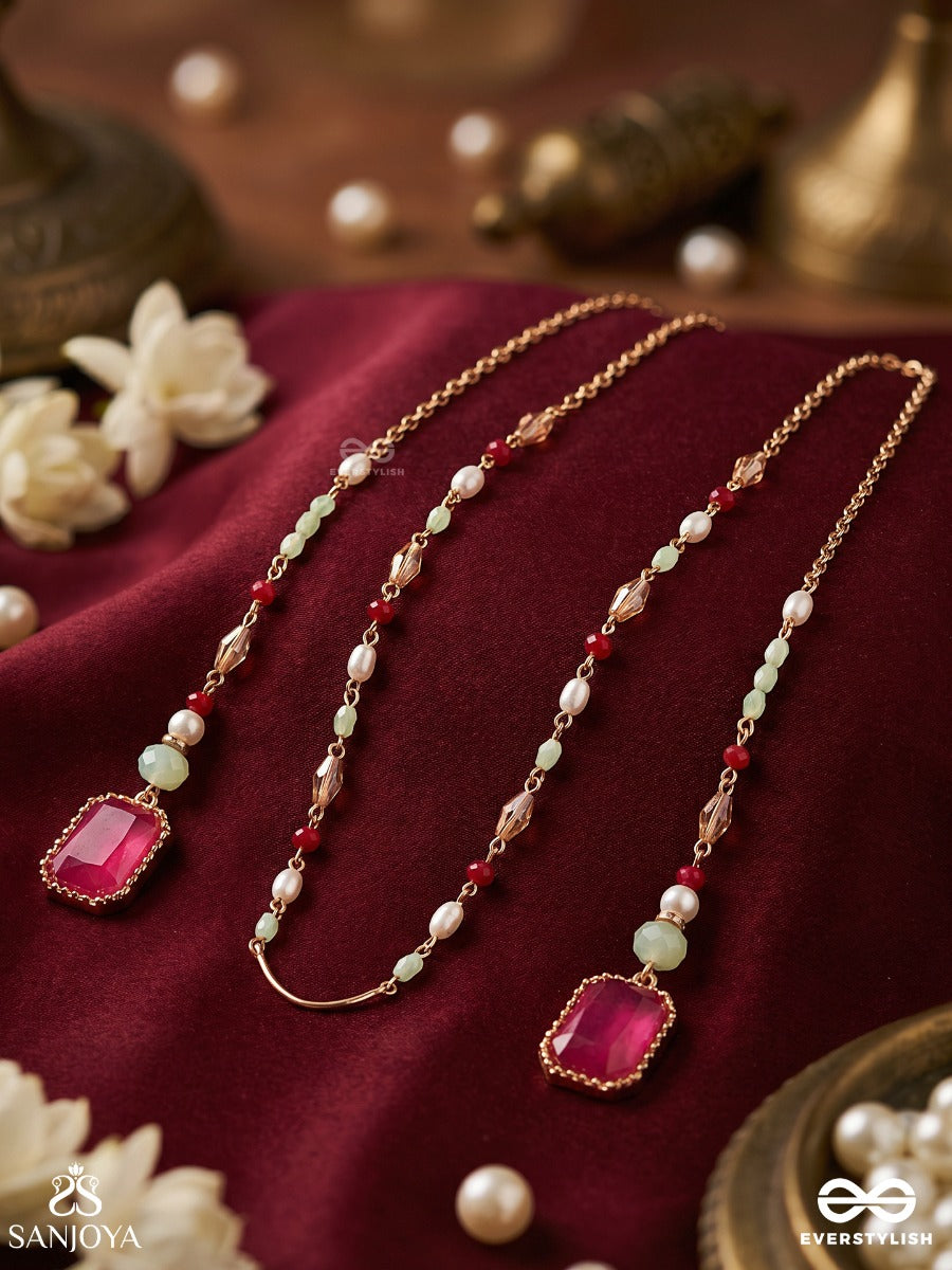 Gulabrekhi – Rose-Toned Trace – Elegant Face Let With Slender Gold-Tone Chains, Magenta Side Stones, Pearl Accents And Delicate Red Bead Details
