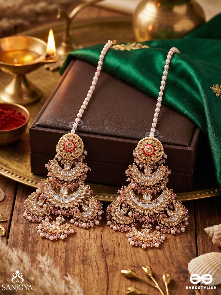 Kesar – Saffron Glow – Ornate Maangtika With Floral Kundan Detailing, Pearl Accents And Delicate Gem Drops