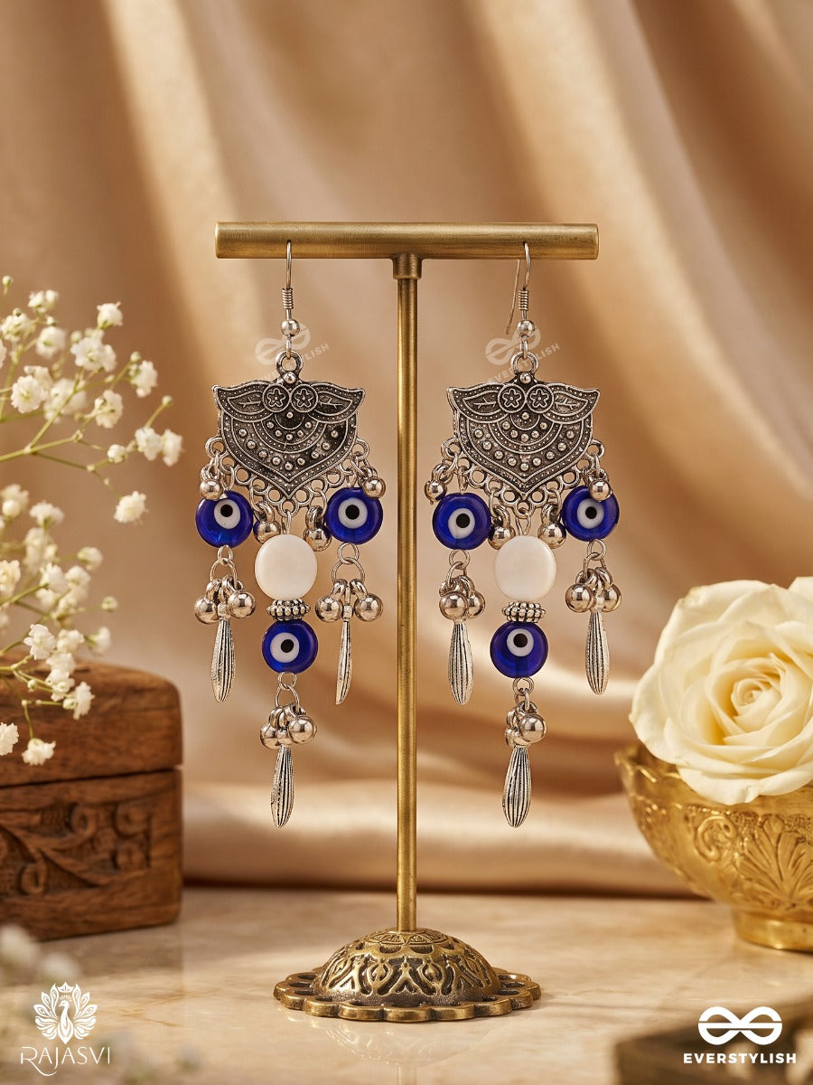 Drishtika – Oxidised Earrings With Blue Evil Eye Beads, Ghungroo Drops And White Accents