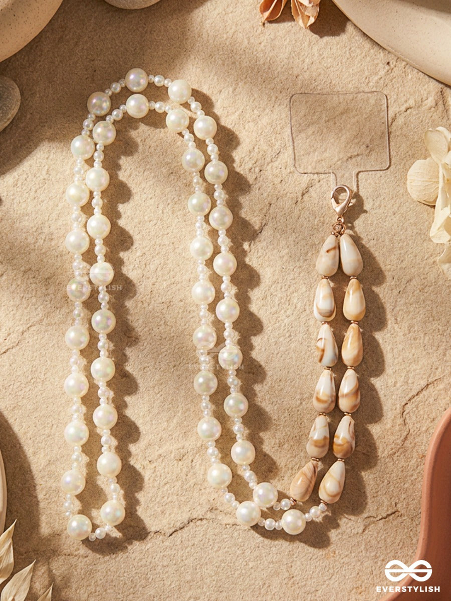 Pearl On Call – Pearl Phone Sling With Natural Shell Details