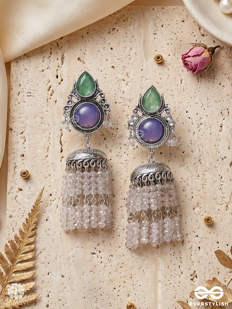 Indraneelika – Oxidised Tassel Earrings With Green Teardrop Stones, Indigo Accents And Pearl Cascades