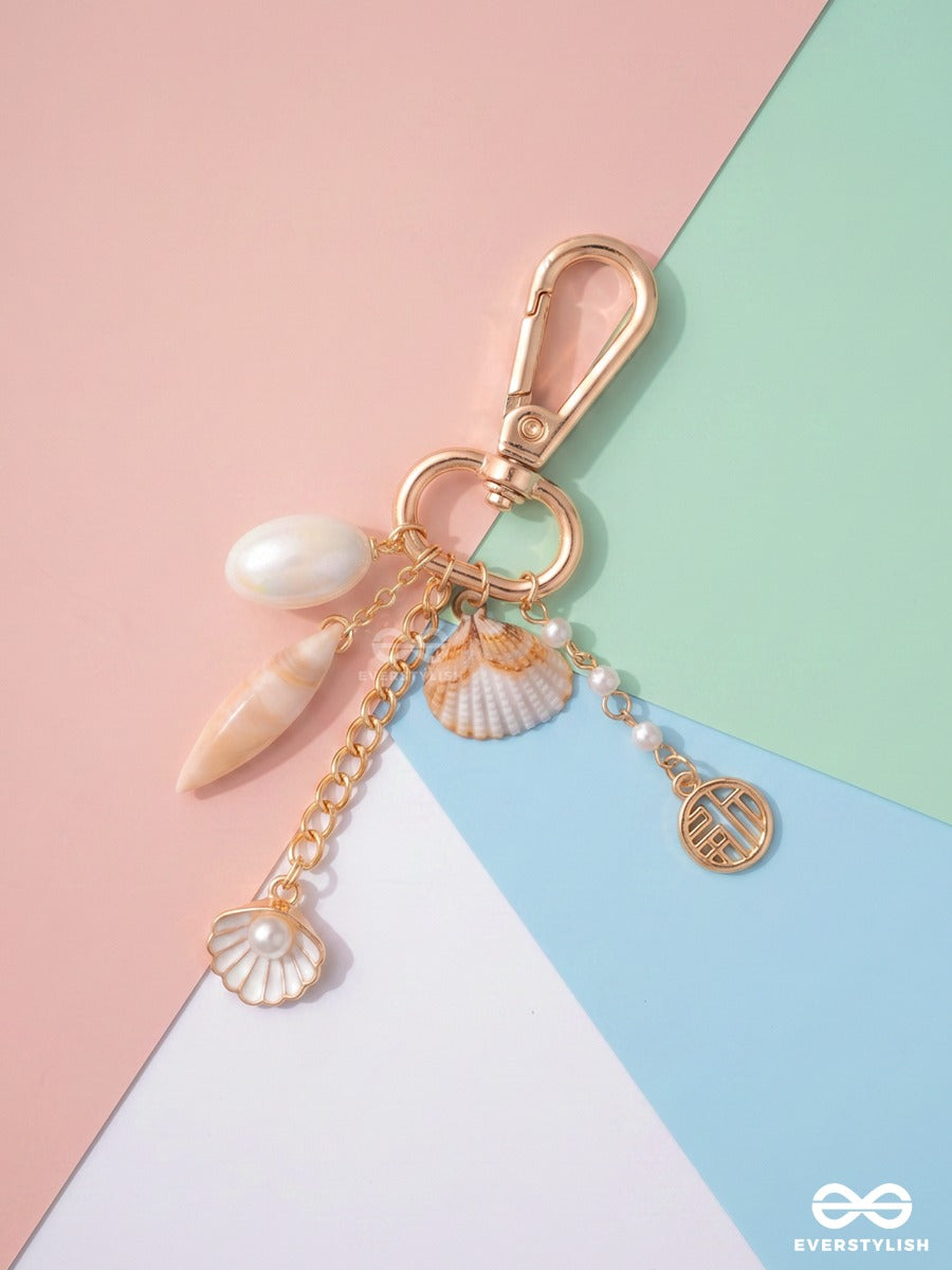 Seas The Day – Coastal Bag Charm With Shell Details And Pearl Accents