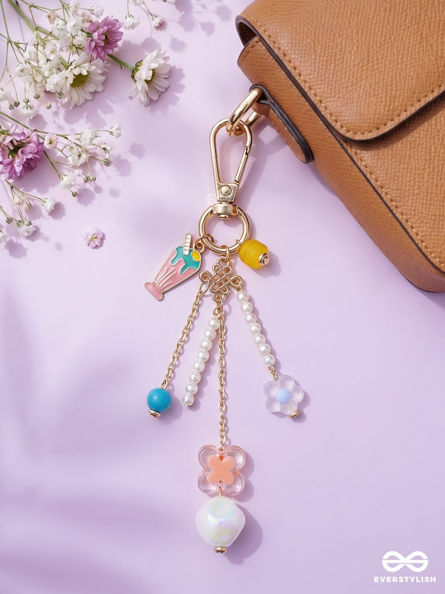 Pocket Bloom – Pastel Bag Charm With Floral And Pearl Details