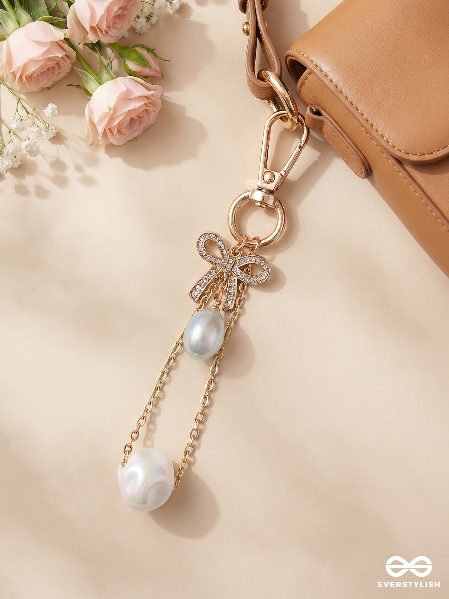 Frosted Bow – Elegant Bag Charm With Crystal And Pearl Drop