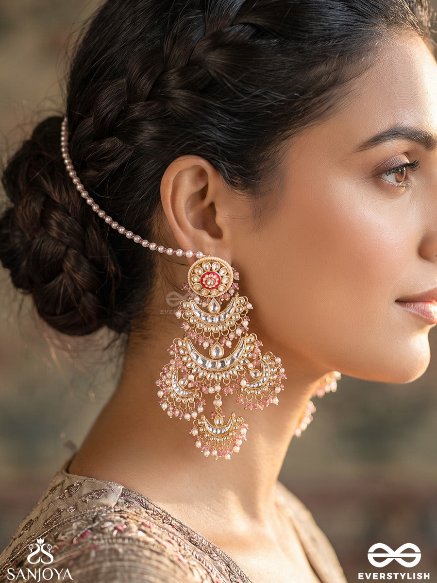 Kesar – Saffron Glow – Ornate Maangtika With Floral Kundan Detailing, Pearl Accents And Delicate Gem Drops