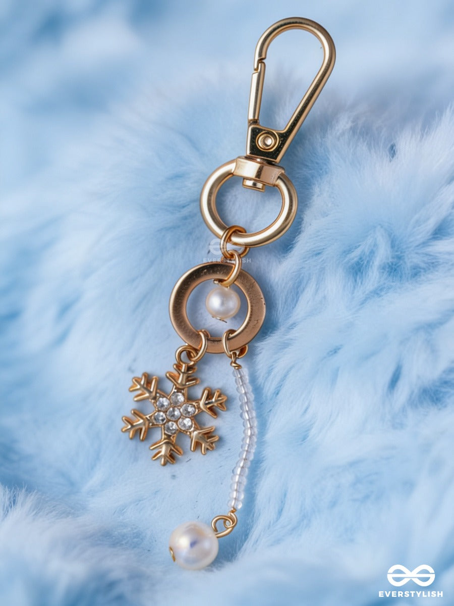 Star Dust – Pearl Bag Charm With Golden Star Details