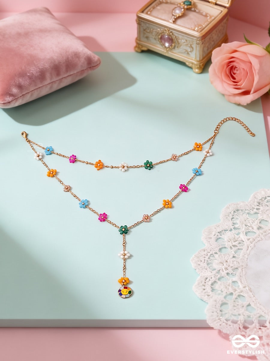 Bloom Carnival – Layered Gold-Tone Necklace With Multicolour Floral Accents