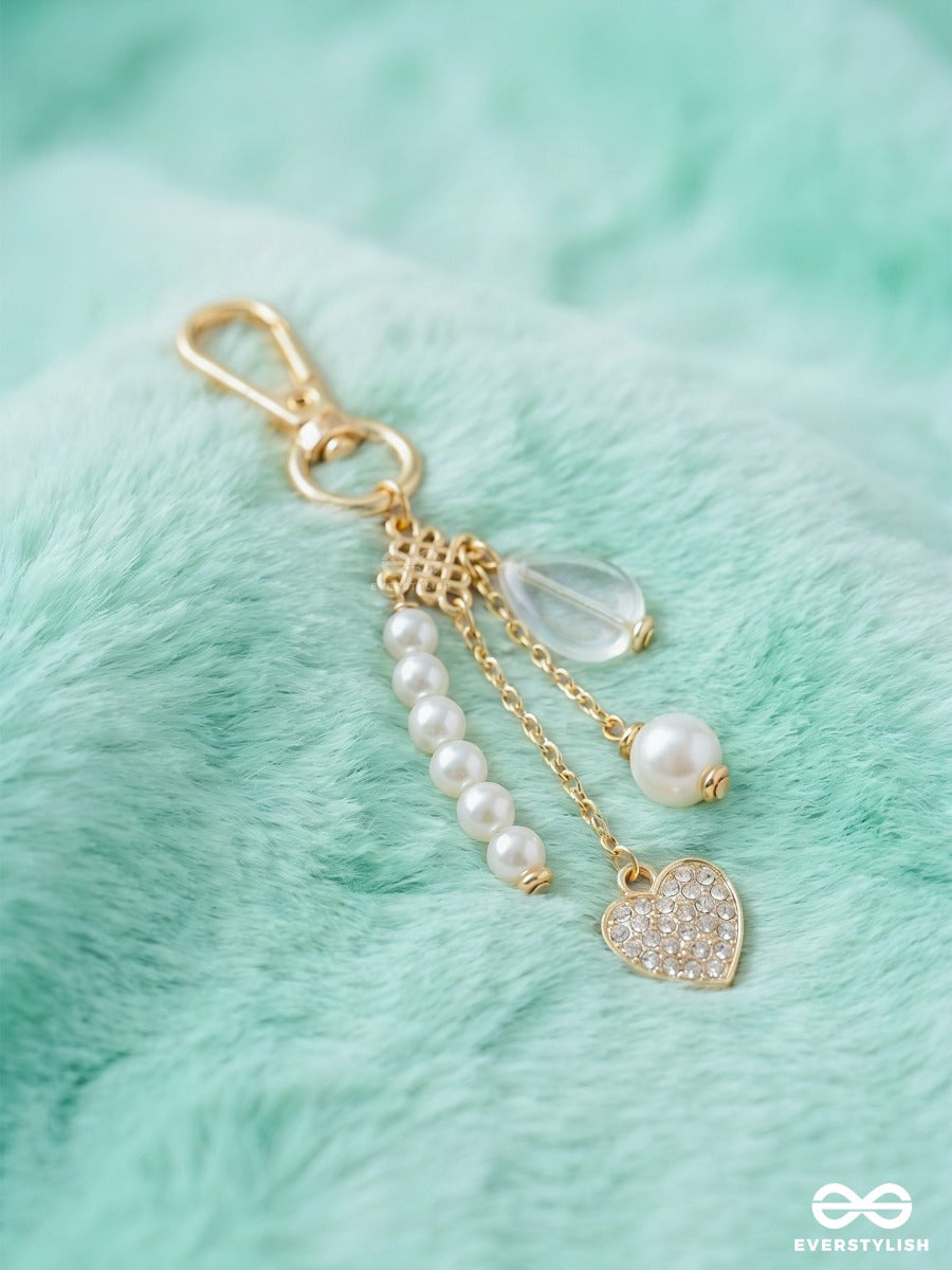 Pearl Perfection – Coquette Bag Charm With Bow Details