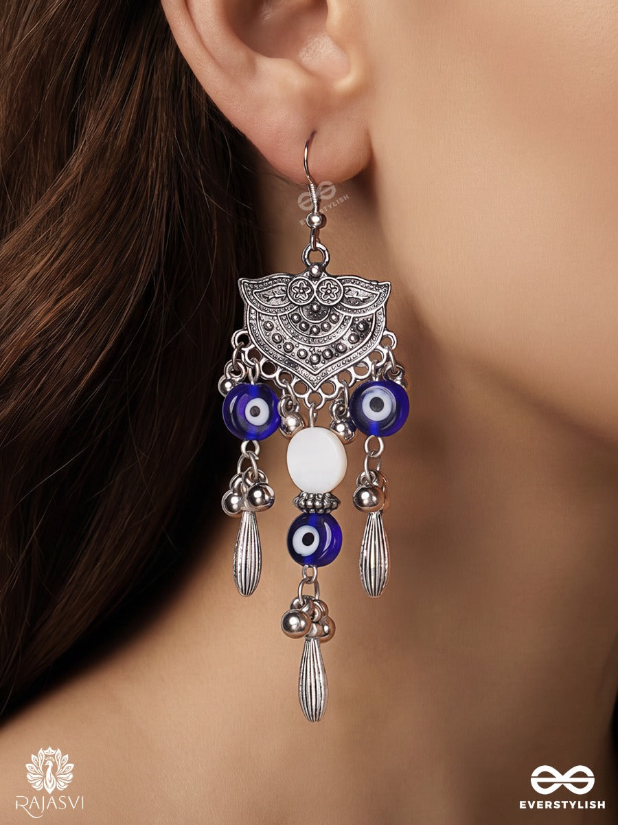 Drishtika – Oxidised Earrings With Blue Evil Eye Beads, Ghungroo Drops And White Accents