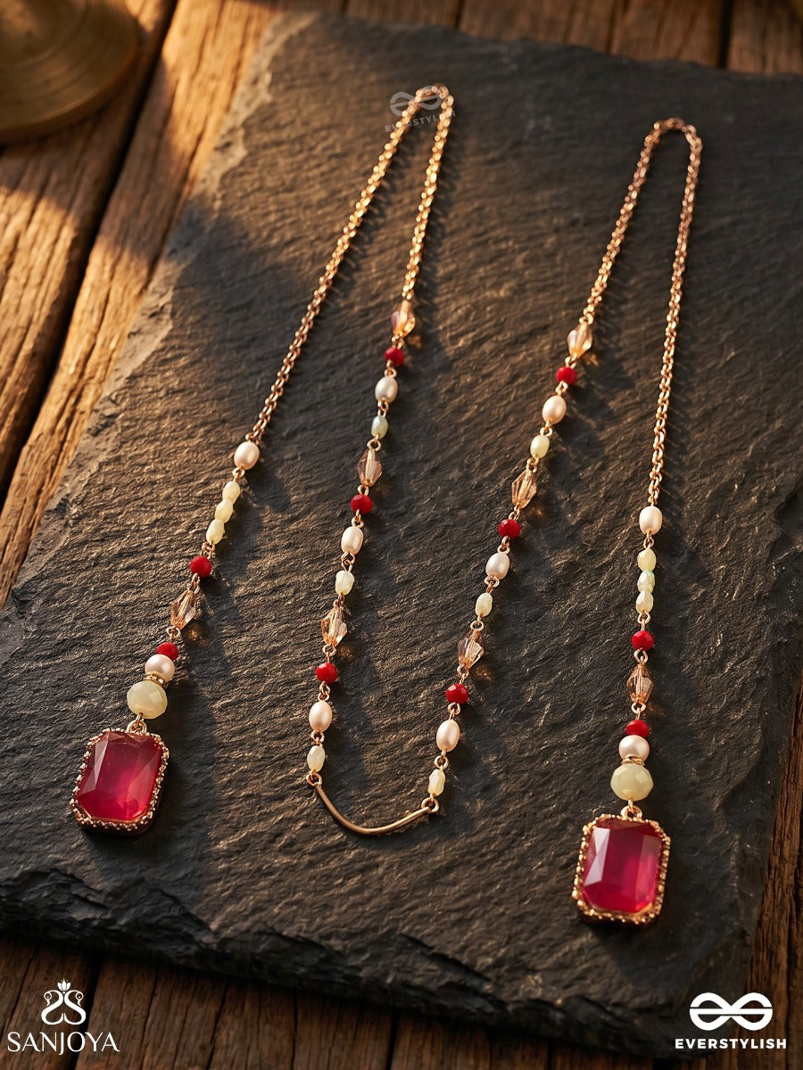 Gulabrekhi – Rose-Toned Trace – Elegant Face Let With Slender Gold-Tone Chains, Magenta Side Stones, Pearl Accents And Delicate Red Bead Details