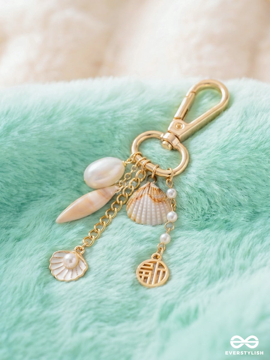 Seas The Day – Coastal Bag Charm With Shell Details And Pearl Accents