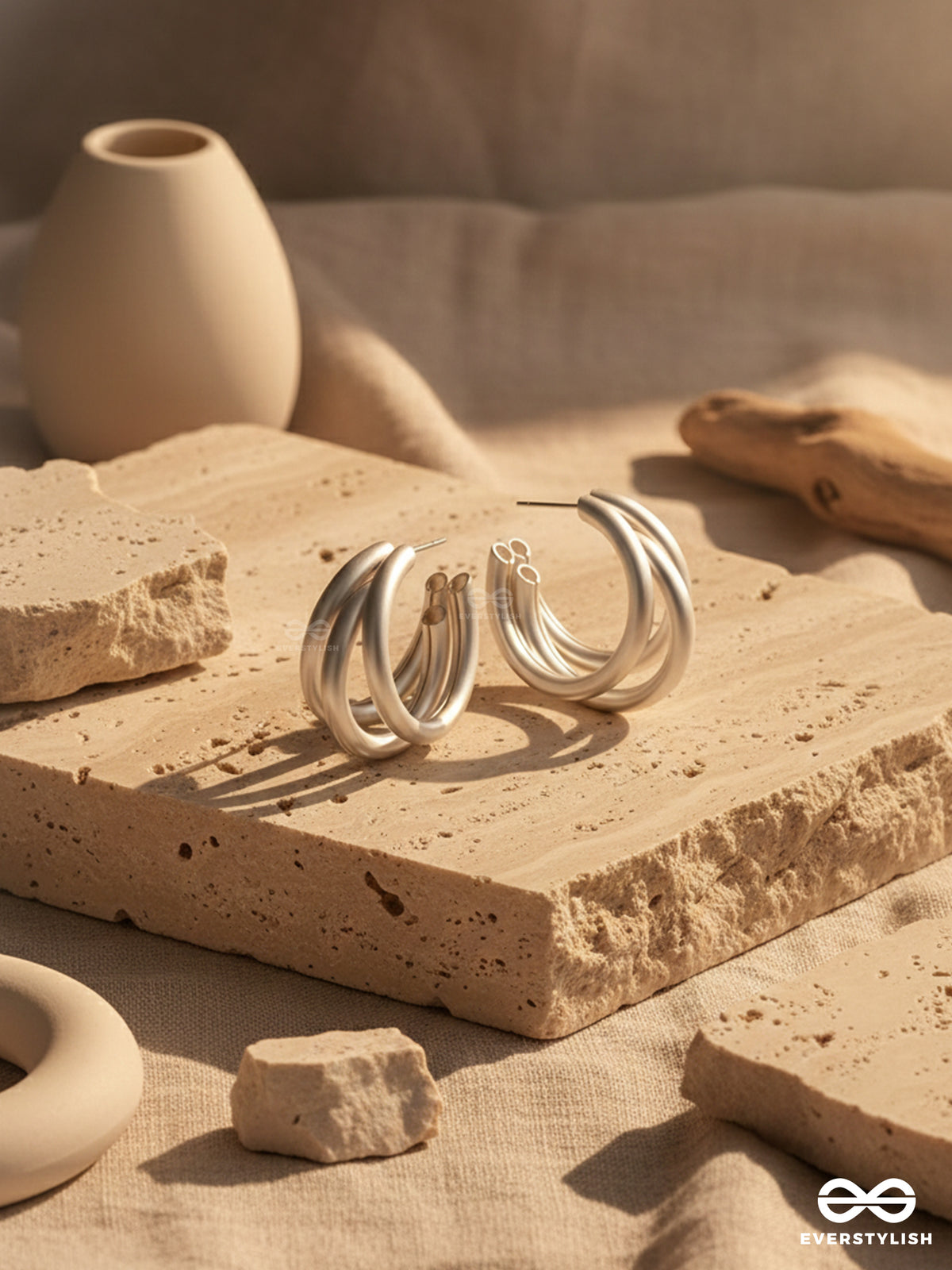 The Elegant Turns - Matte Finished Silver Hoops