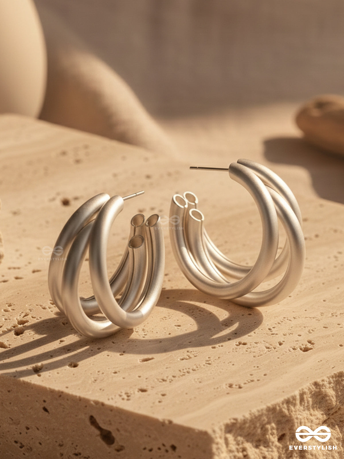 The Elegant Turns - Matte Finished Silver Hoops