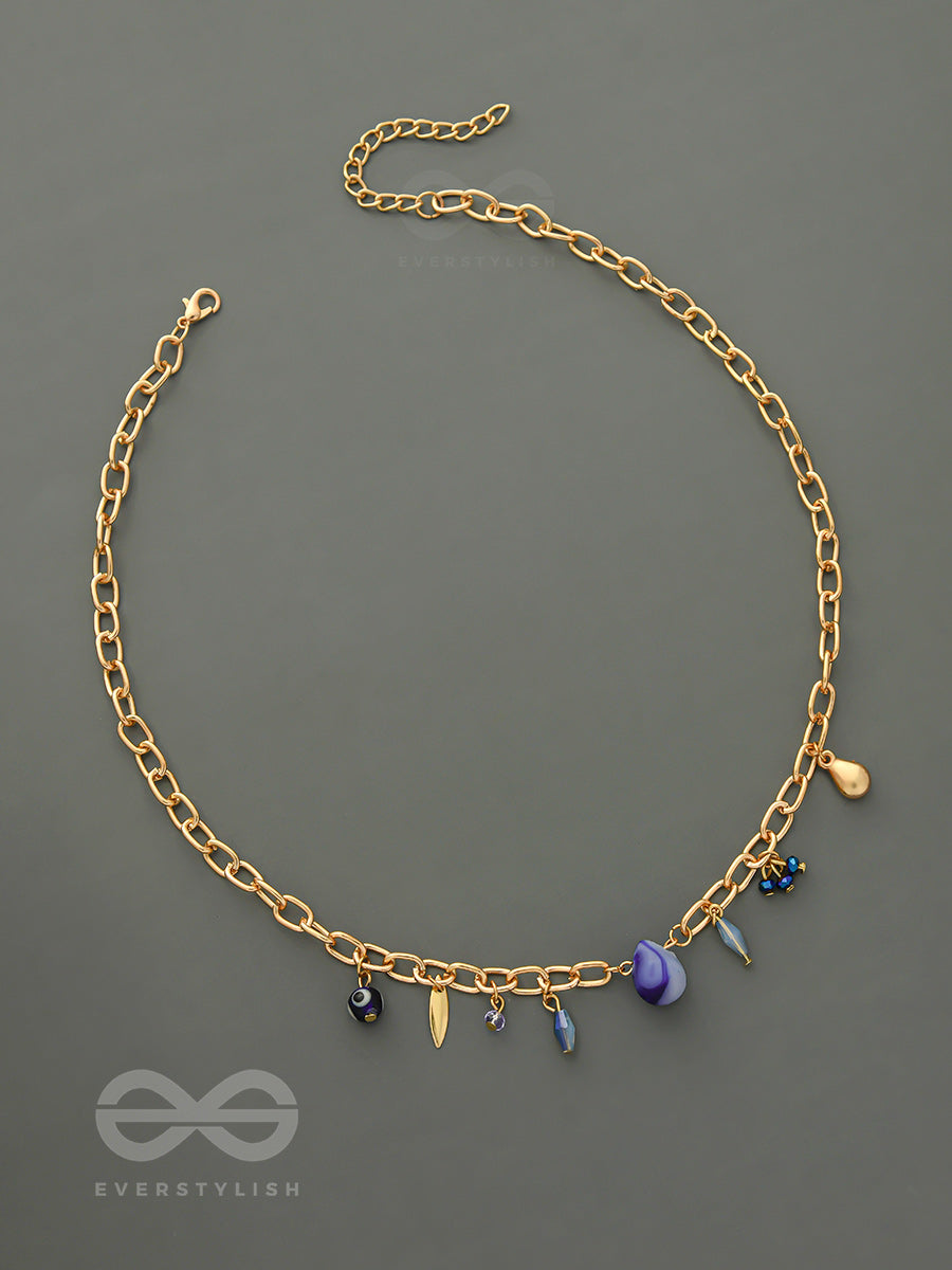 Fragments Of The Sky- Blue Crystals Studded Golden Necklace