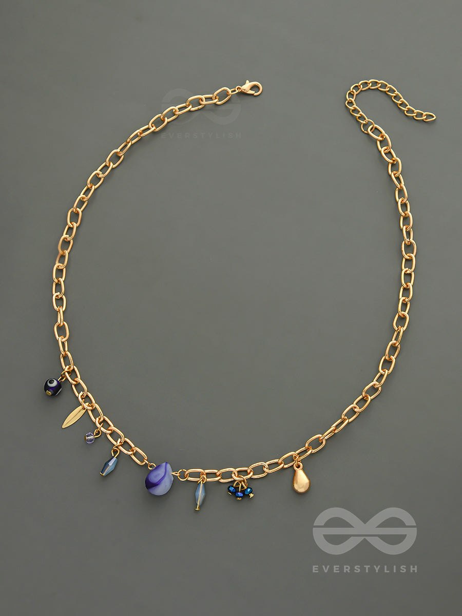 Fragments Of The Sky- Blue Crystals Studded Golden Necklace