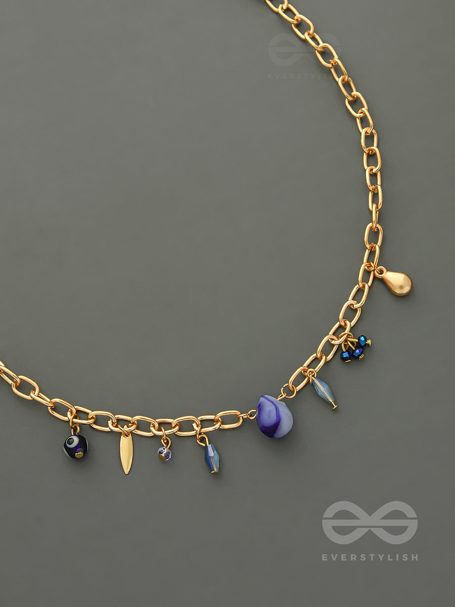 Fragments Of The Sky- Blue Crystals Studded Golden Necklace