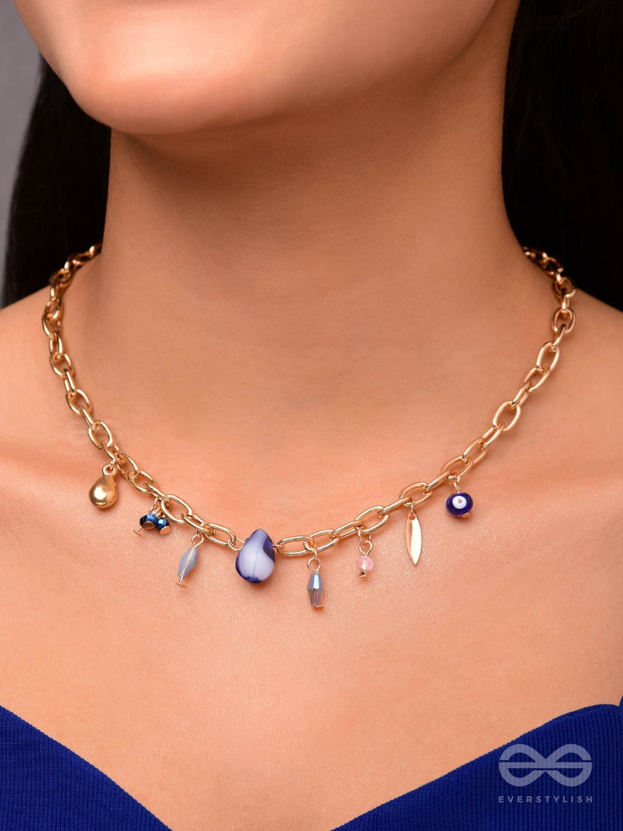 Fragments Of The Sky- Blue Crystals Studded Golden Necklace