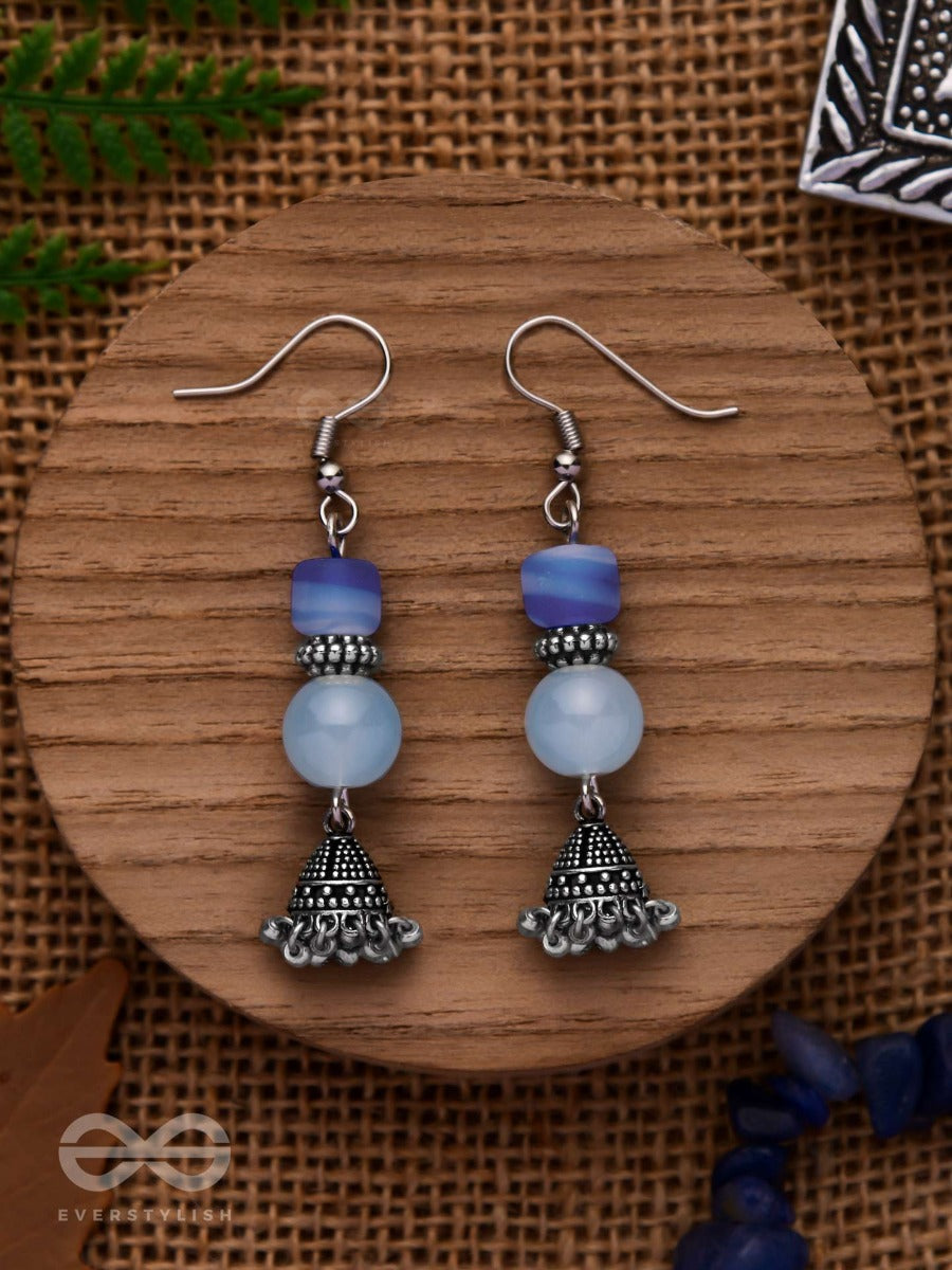 A Celestial Wave - Embellished Oxidised Jhumka Earrings