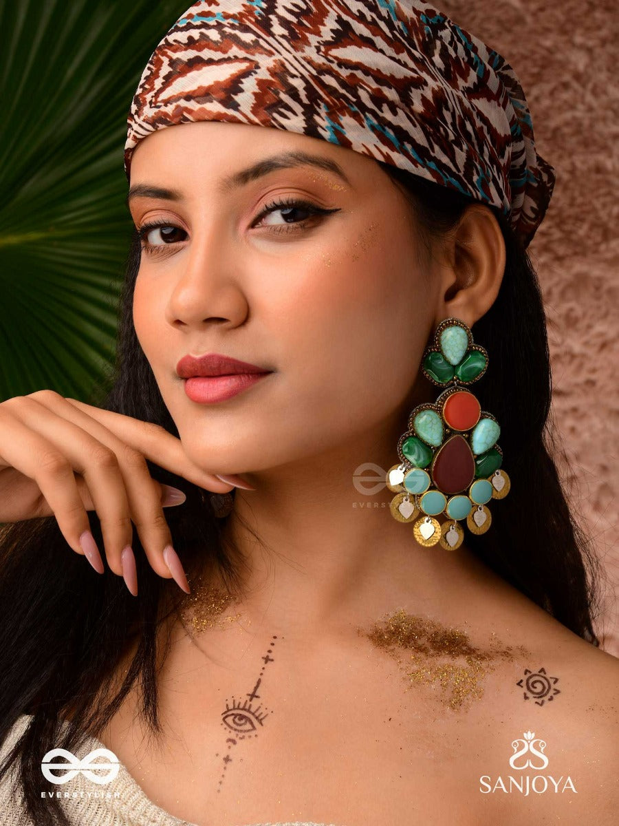 Vikrtisila- Elegant Form-Chunky Blue, Green, And Rust-Colored Stones With A Distinctive Golden-Silver Leaflet Design