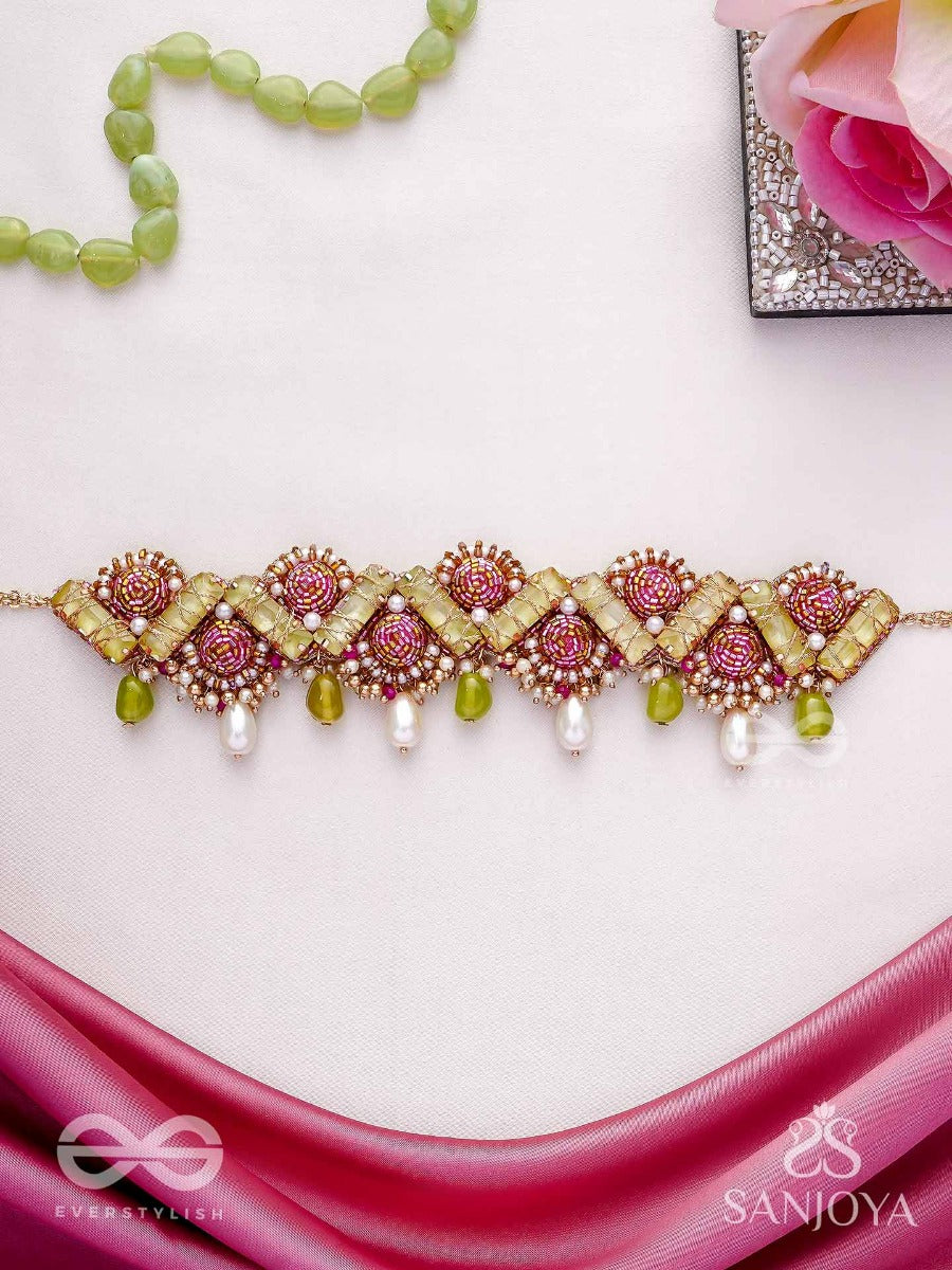 Manimekhala-Bejewelled Girdle-Choker Adorned With Pink And Gold Gemstones, Beads And Delicate Pearl Drops.