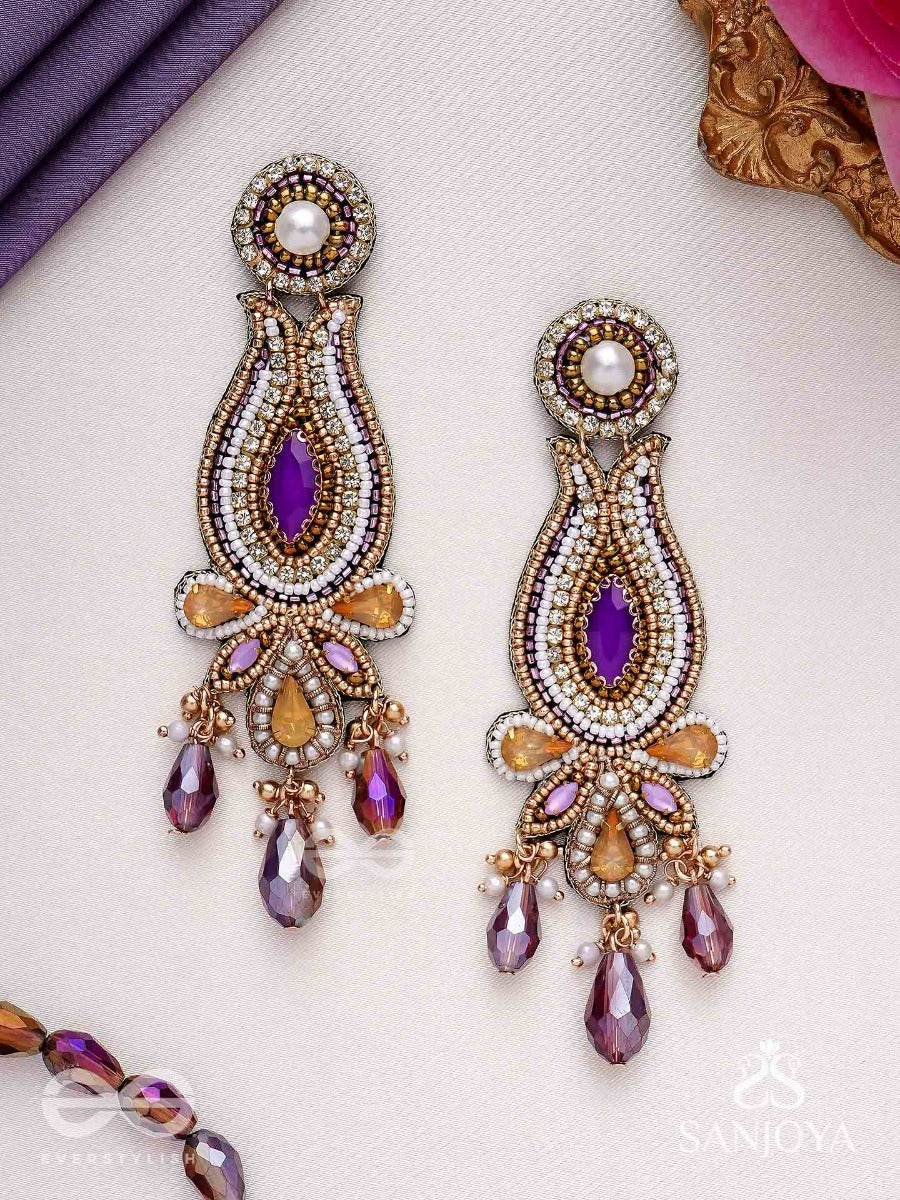 Divyashobhana-Divine Splendour-Lotus-Inspired Embroidered Design, Adorned With Purple And Golden Gem-Studded Motifs, Pearl And Beads.