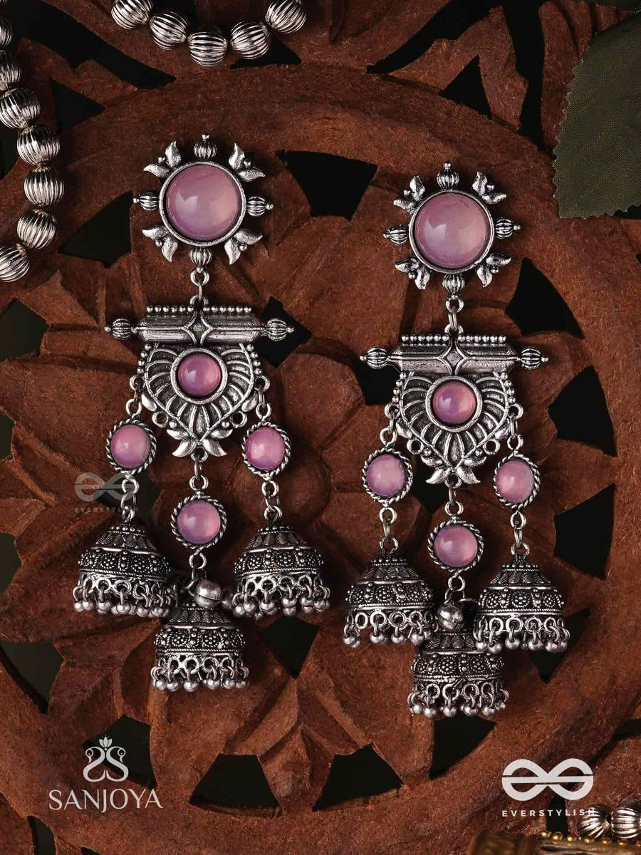 Vijayamukta-Victory Pearls- Regal Oxidized Earrings With A Central Purple Stone And Layered Jhumkas