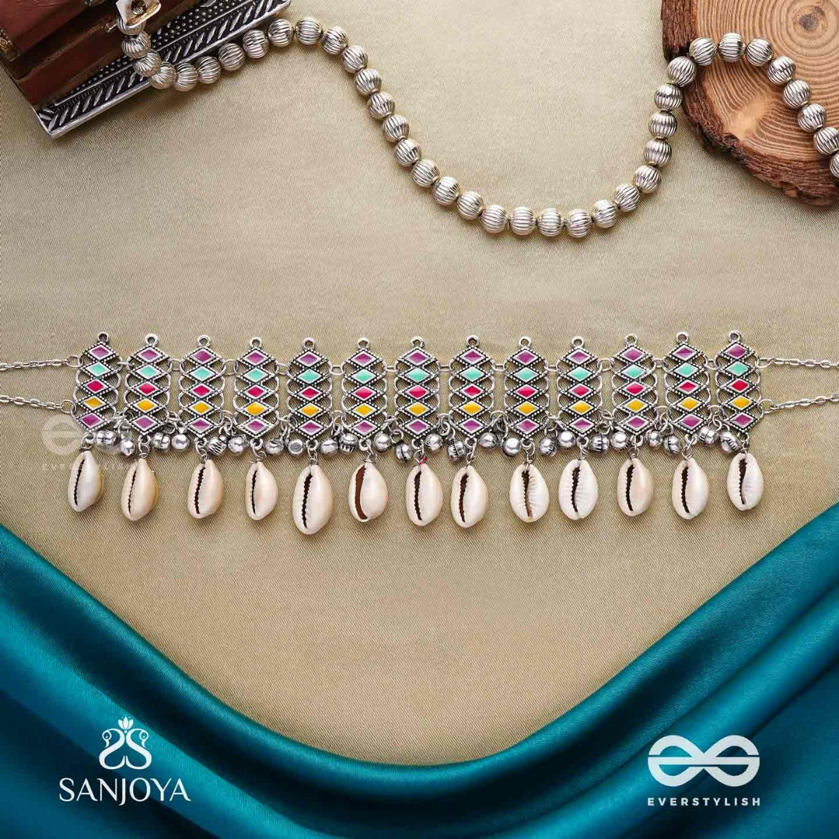 Shankhamala-Conch Garland- Oxidized Neckpiece Featuring Pastel-Coloured Metalwork, Embellished With Dangling Cowrie Shells And Ghungroo's
