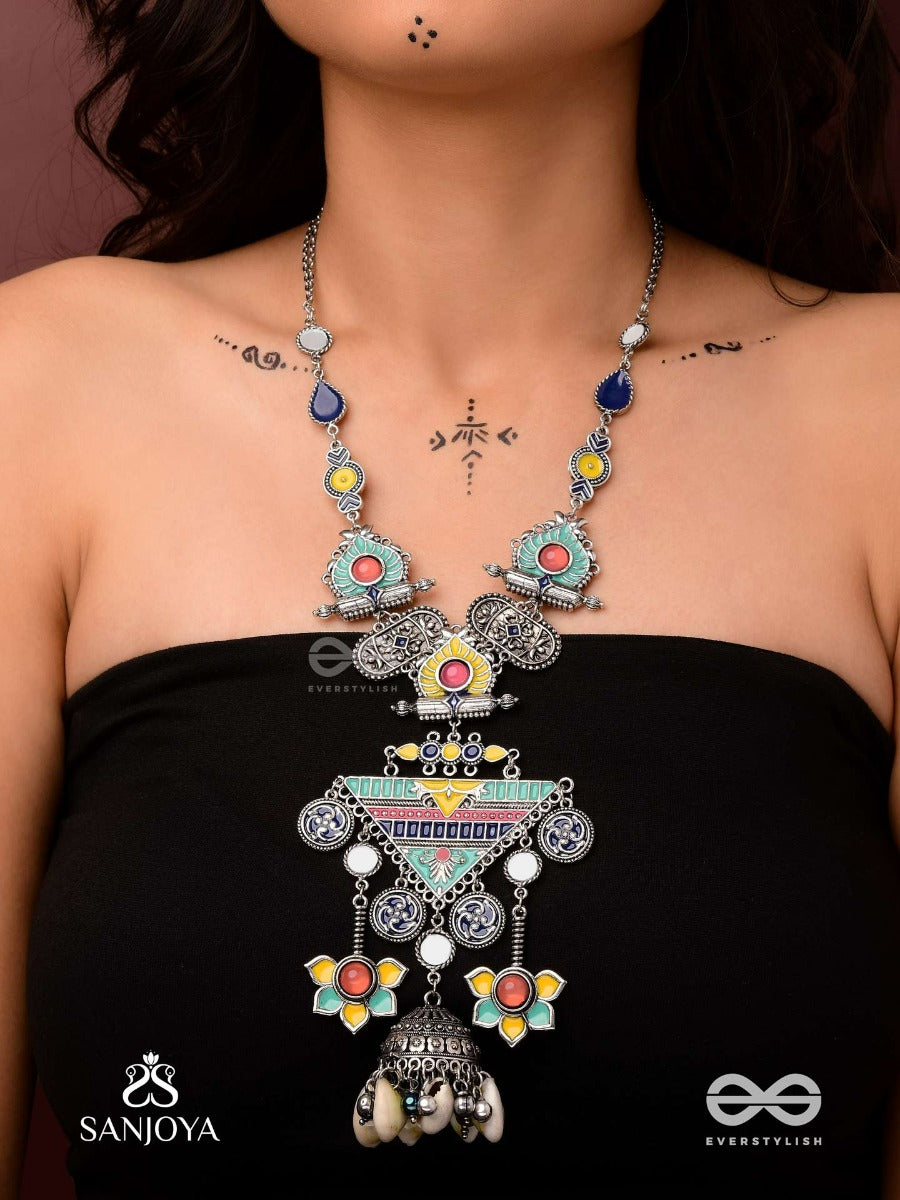 Rangapadma-Color Bloom- Enamelled Neckpiece With Cowrie Shells,Mirror And Colorful Gemstones On Oxidized Metalwork.