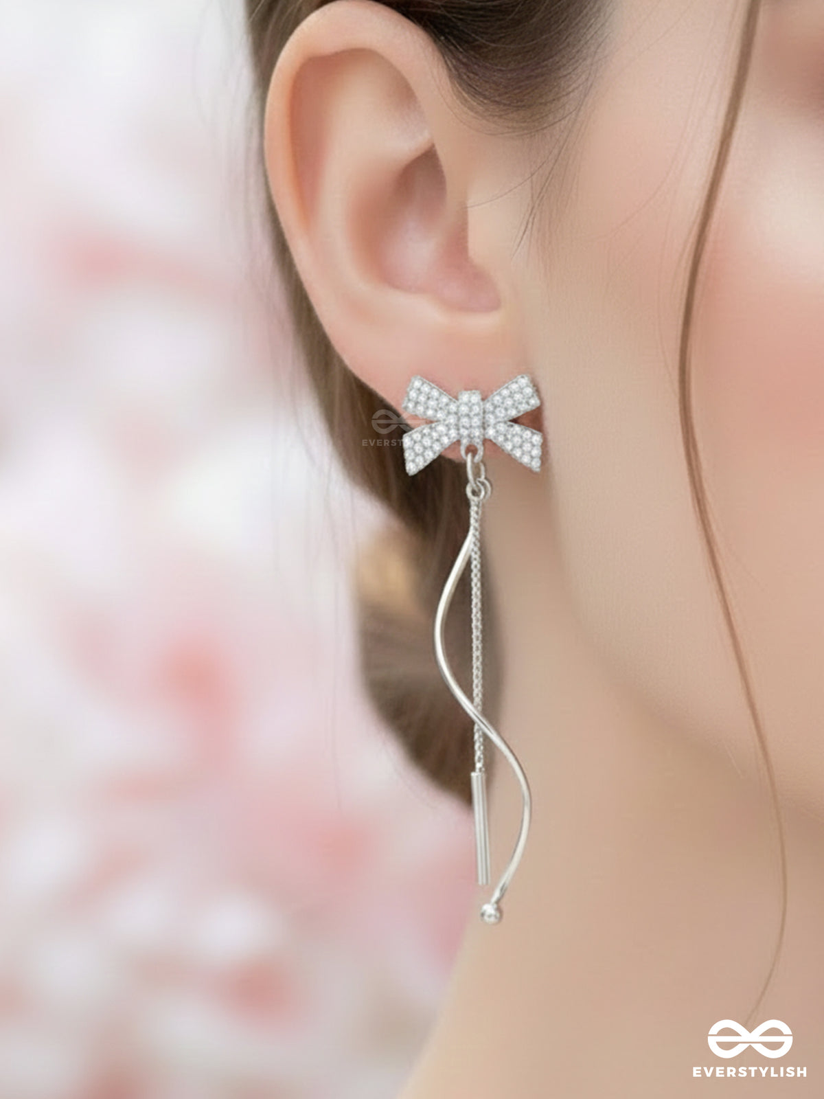 Starry Knots- Dangling Silver Cubic Zirconia Earrings