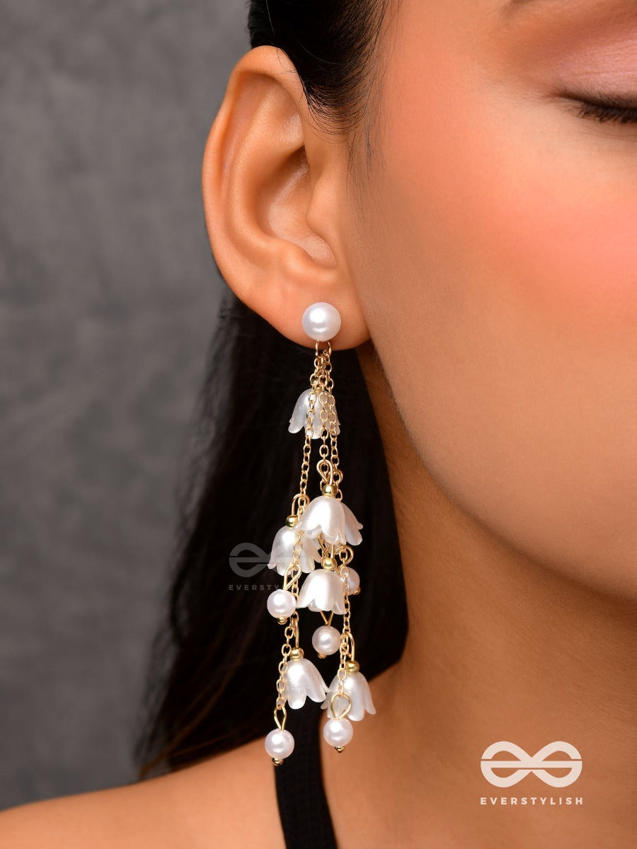 Strings Of Promise - Metallic Dangling White Rose Earrings