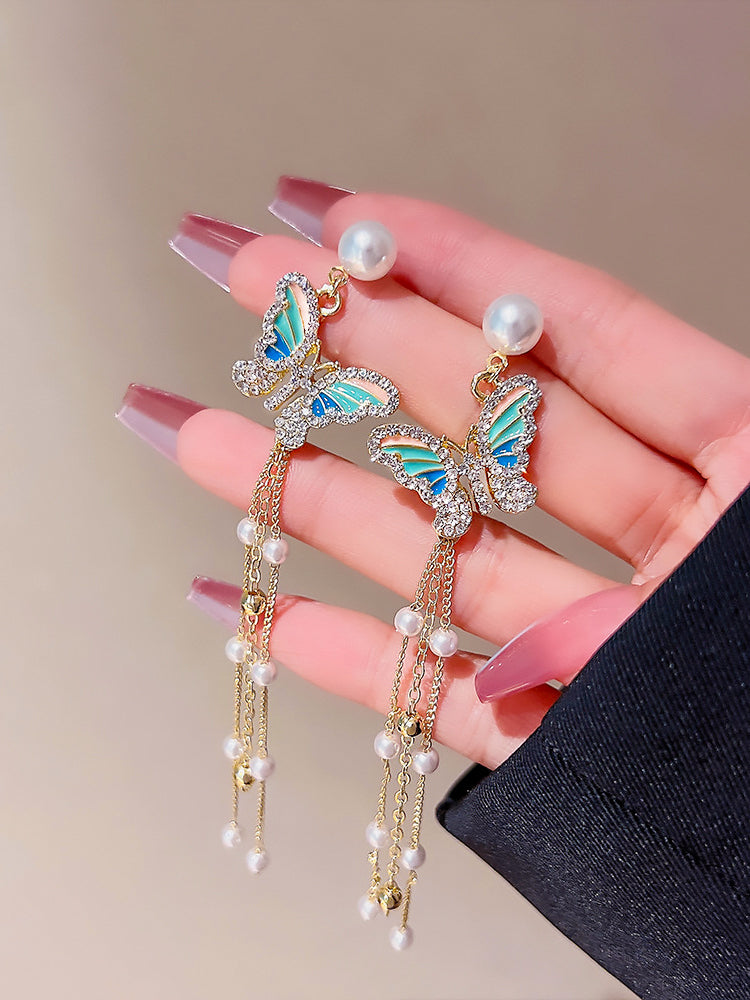 Serene Seabreeze - Dangling Butterfly Aqua Earrings