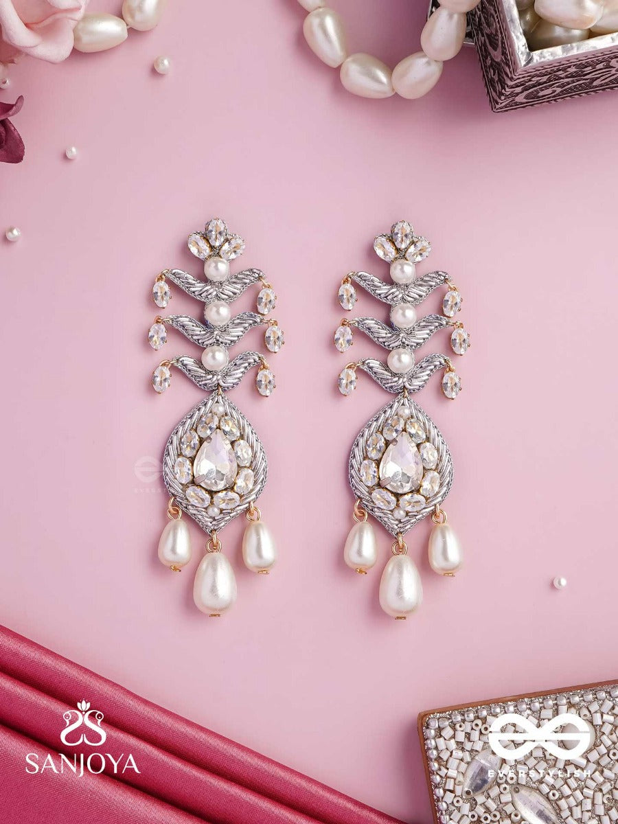Shwetapushpa- Shloka Ambani Inspired Earrings With Silver Accents, CZ Stones And Pearls
