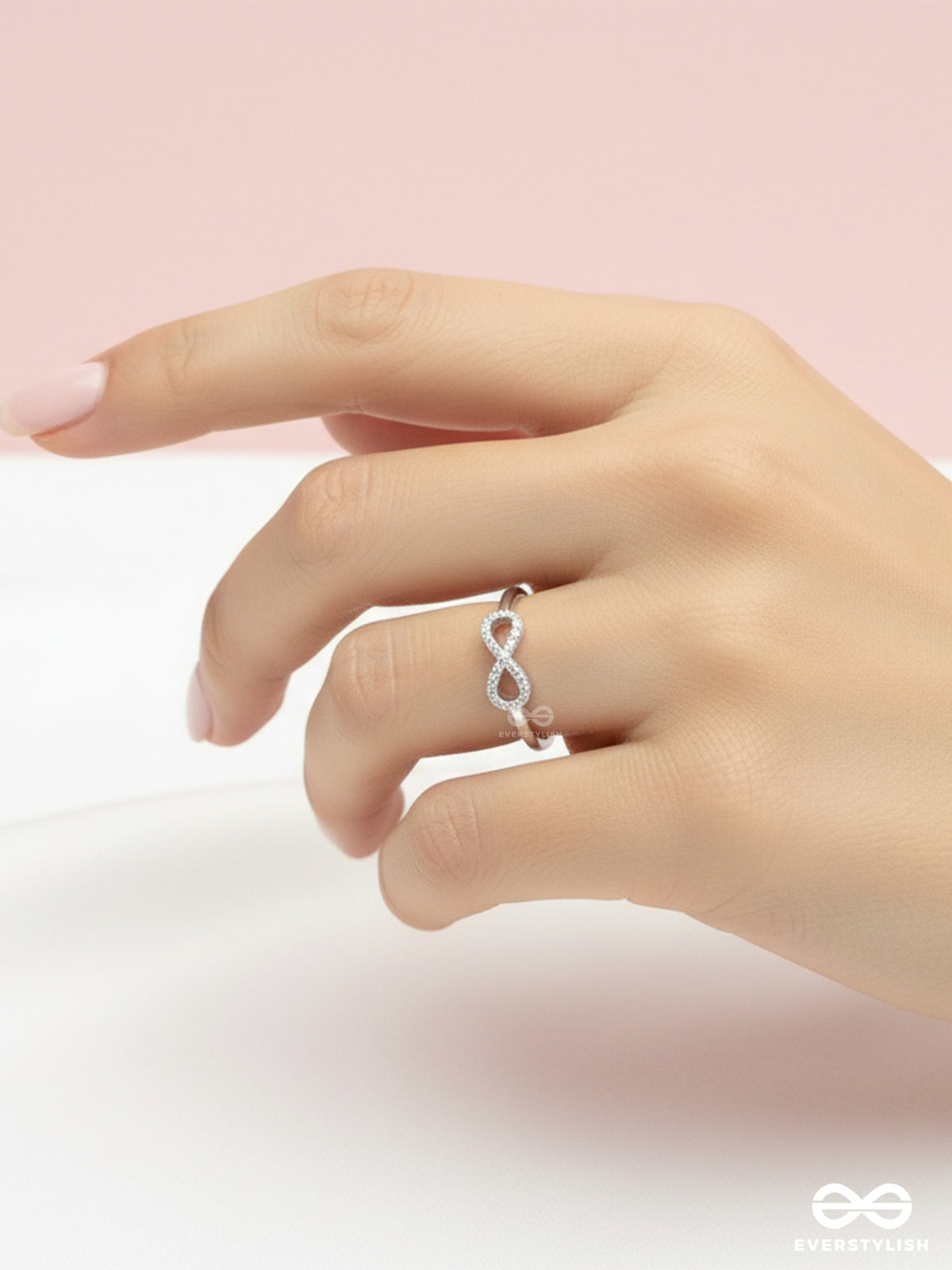 Infinite Lustre- Dainty And Elegant Infinity Band With CZ Stones