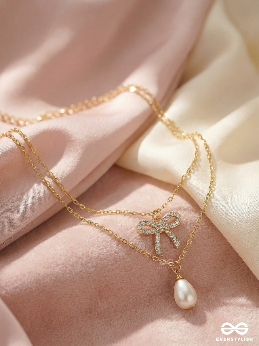 Pearl Whisper - Elegant Bow Necklace