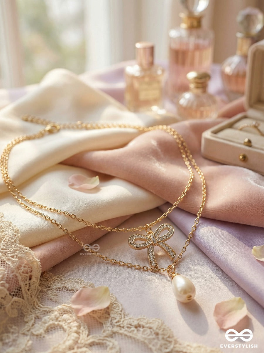 Pearl Whisper - Elegant Bow Necklace