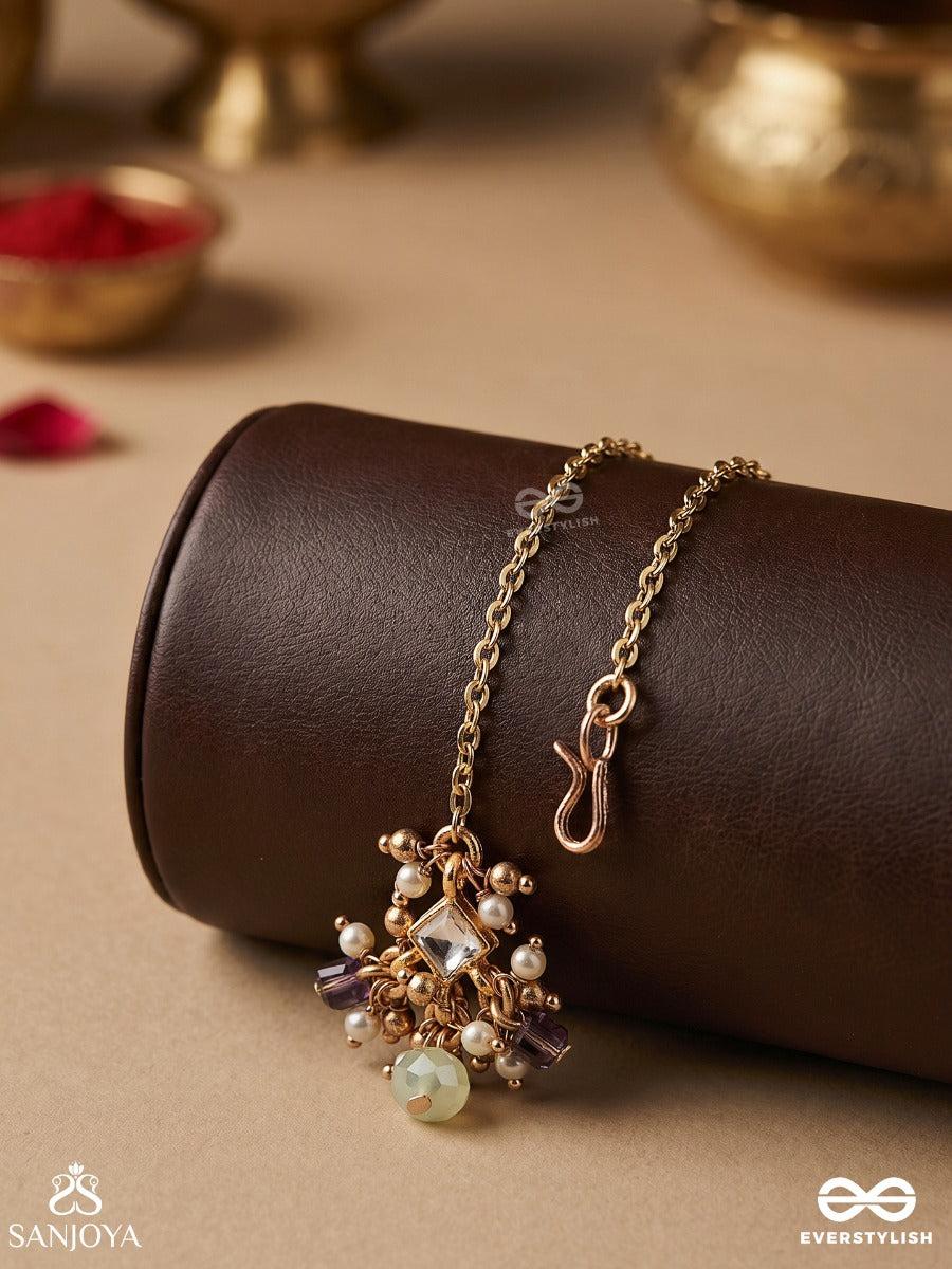Harshita - The Joyful One- Delicate Pearl Maangtika With Mini Kundan Blooms And Green Gem Droplets